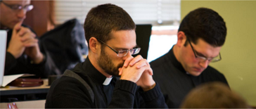 seminarians praying in class b