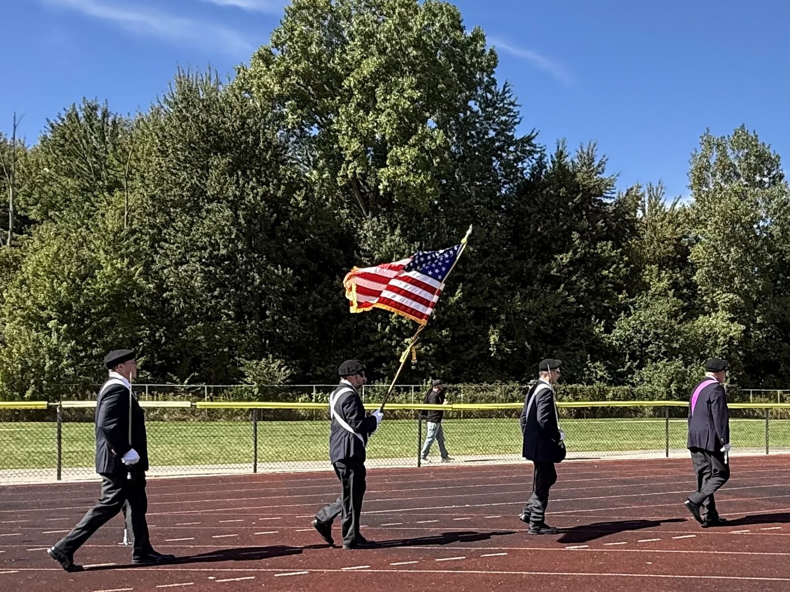 Fourth Degree Color Corps marching on the track at East China Stadium